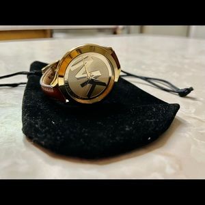 Genuine medium brown leather, authentic Michael Kors watch